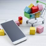 cell phone and shopping cart , Online shopping , mobile shopping concept
